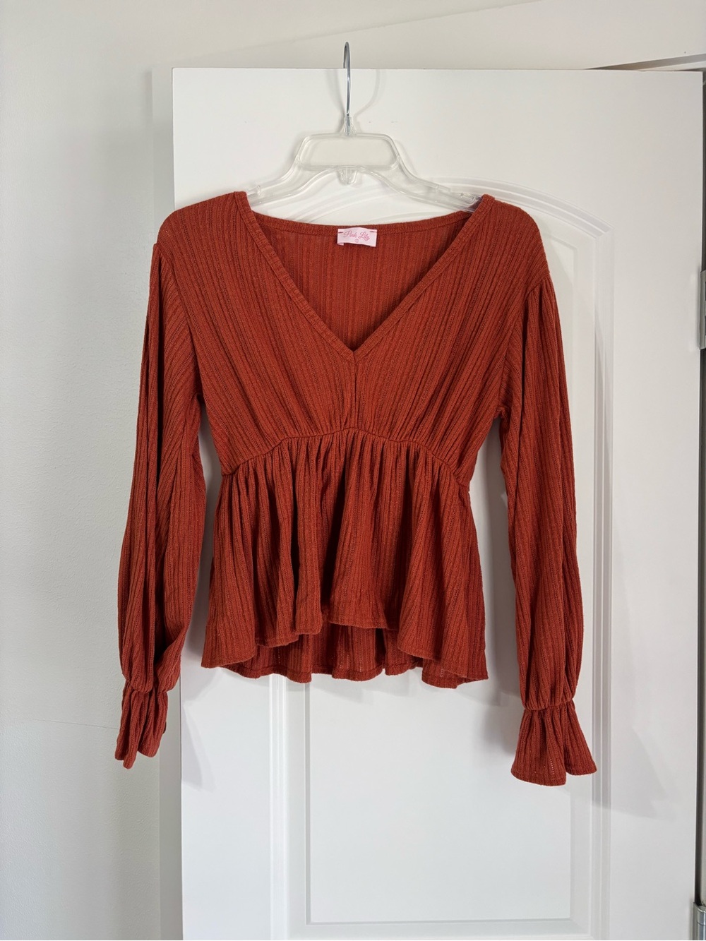 Rust Ruffle Hem V-Neck Long Sleeve Top